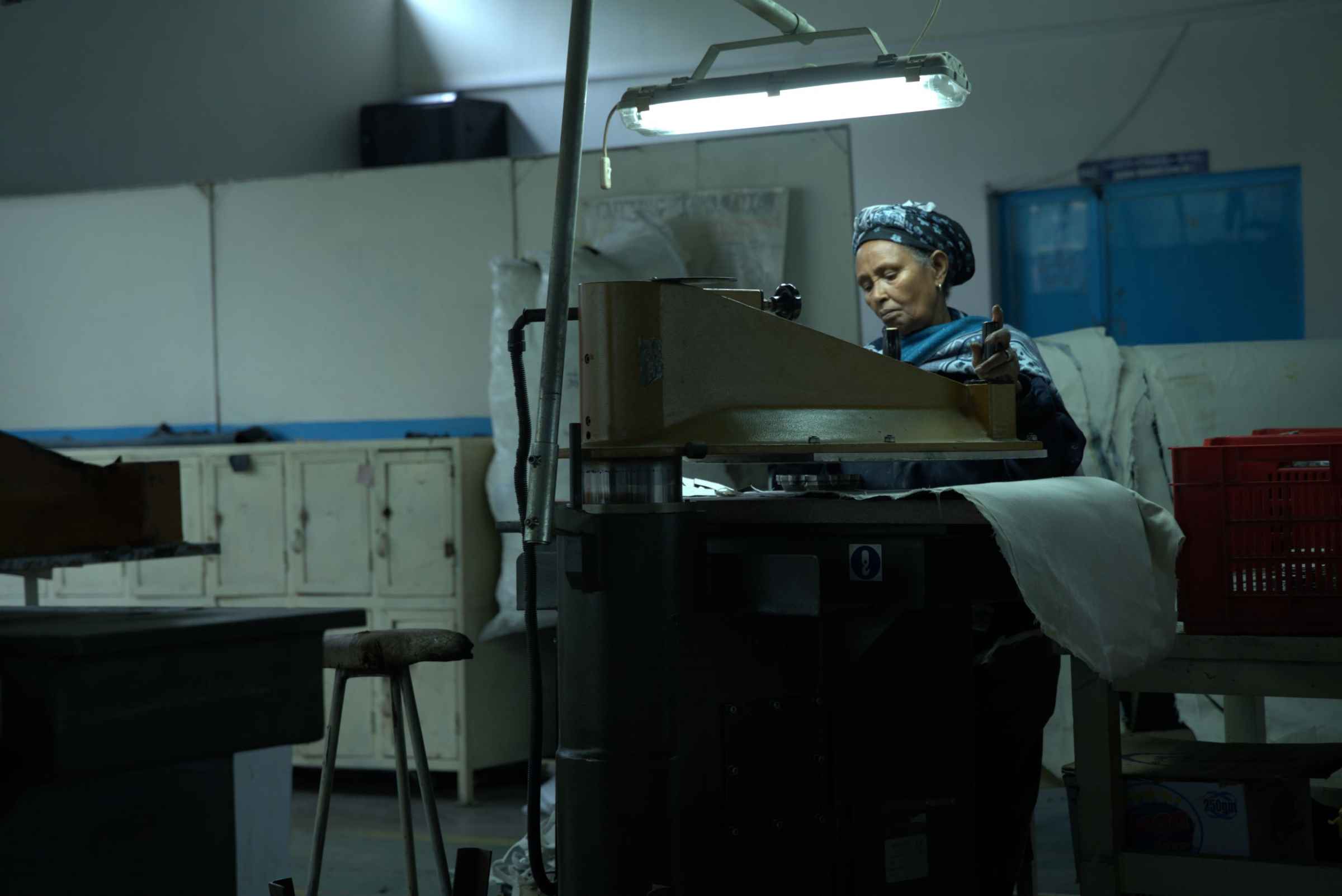 A craftswoman at work in an ELICO factory